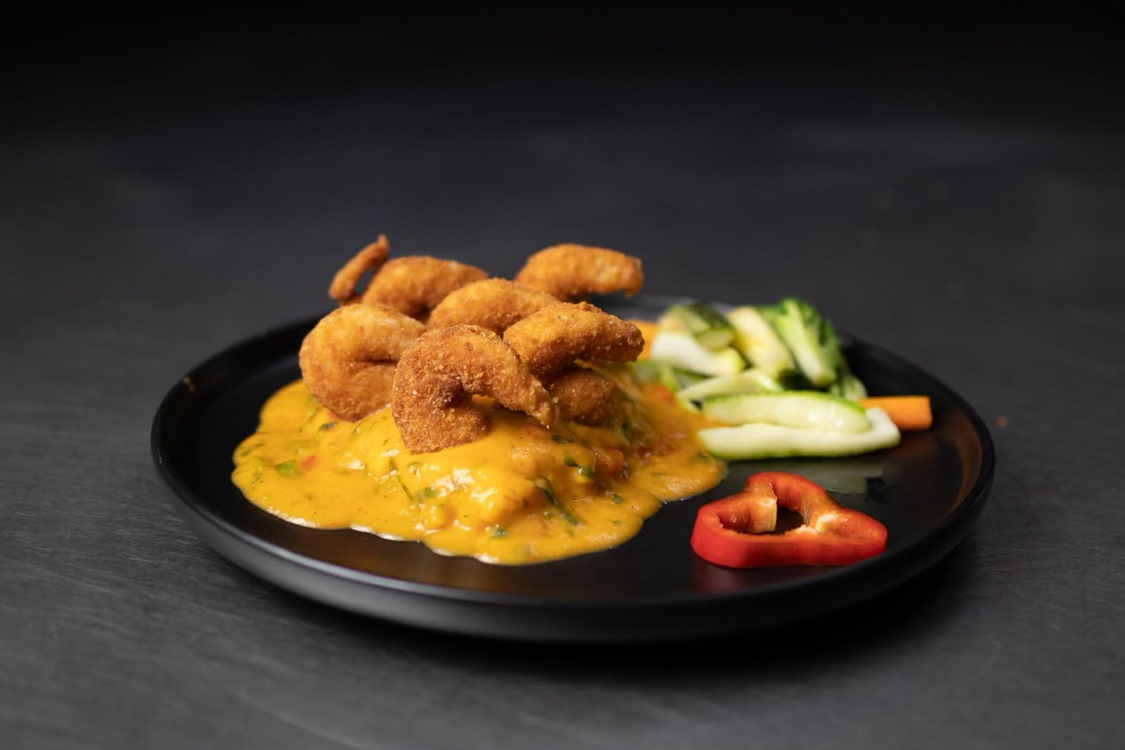 Camarones empanizados en salsa